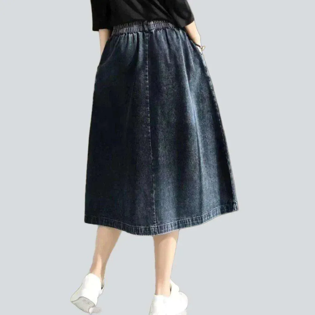 Asymmetric denim skirt with rubber