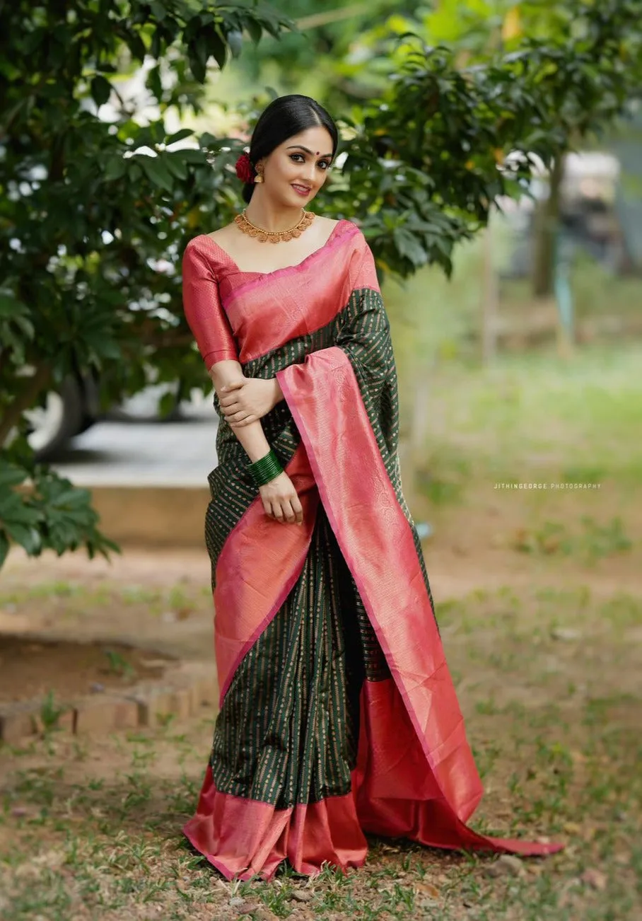 Delectable Green Soft Silk Saree With Confounding Blouse Piece